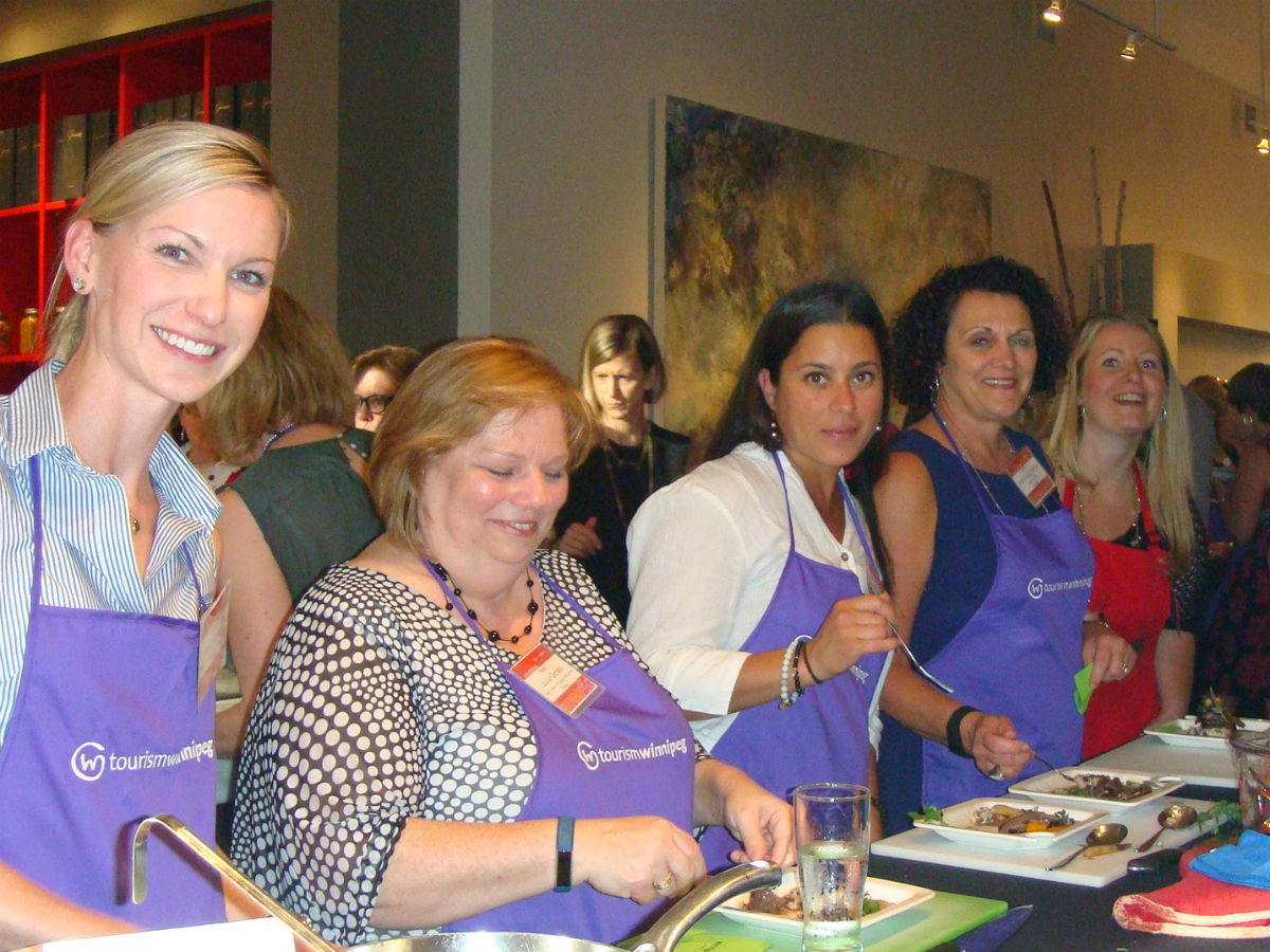 There are never too many cooks in the kitchen when you are partying with Team Winnipeg - Braised bison was one of the four food stations at the event (Karen Goossen)